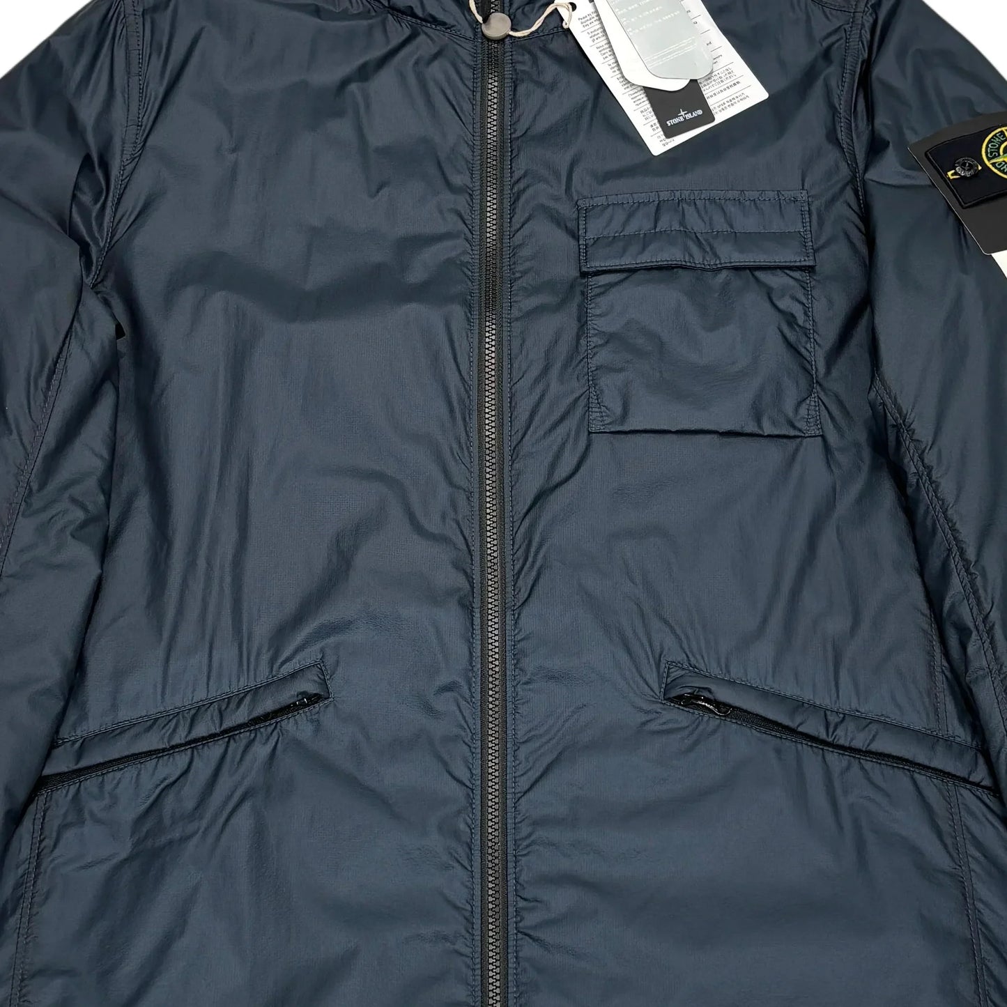 Stone Island Navy Blue Bio-Based Ripstop Nylon with Primaloft Insulation Technology Jacket